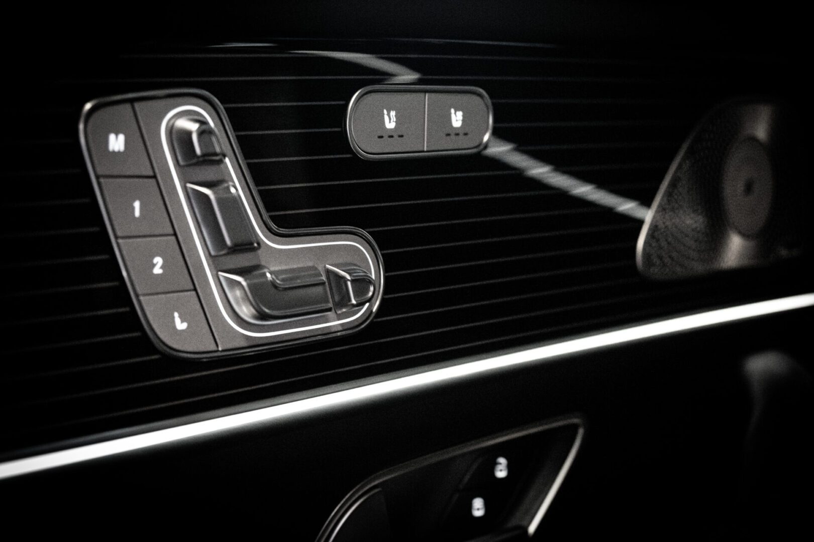 A close up of the buttons on a car